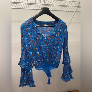 Free People floral body suit.